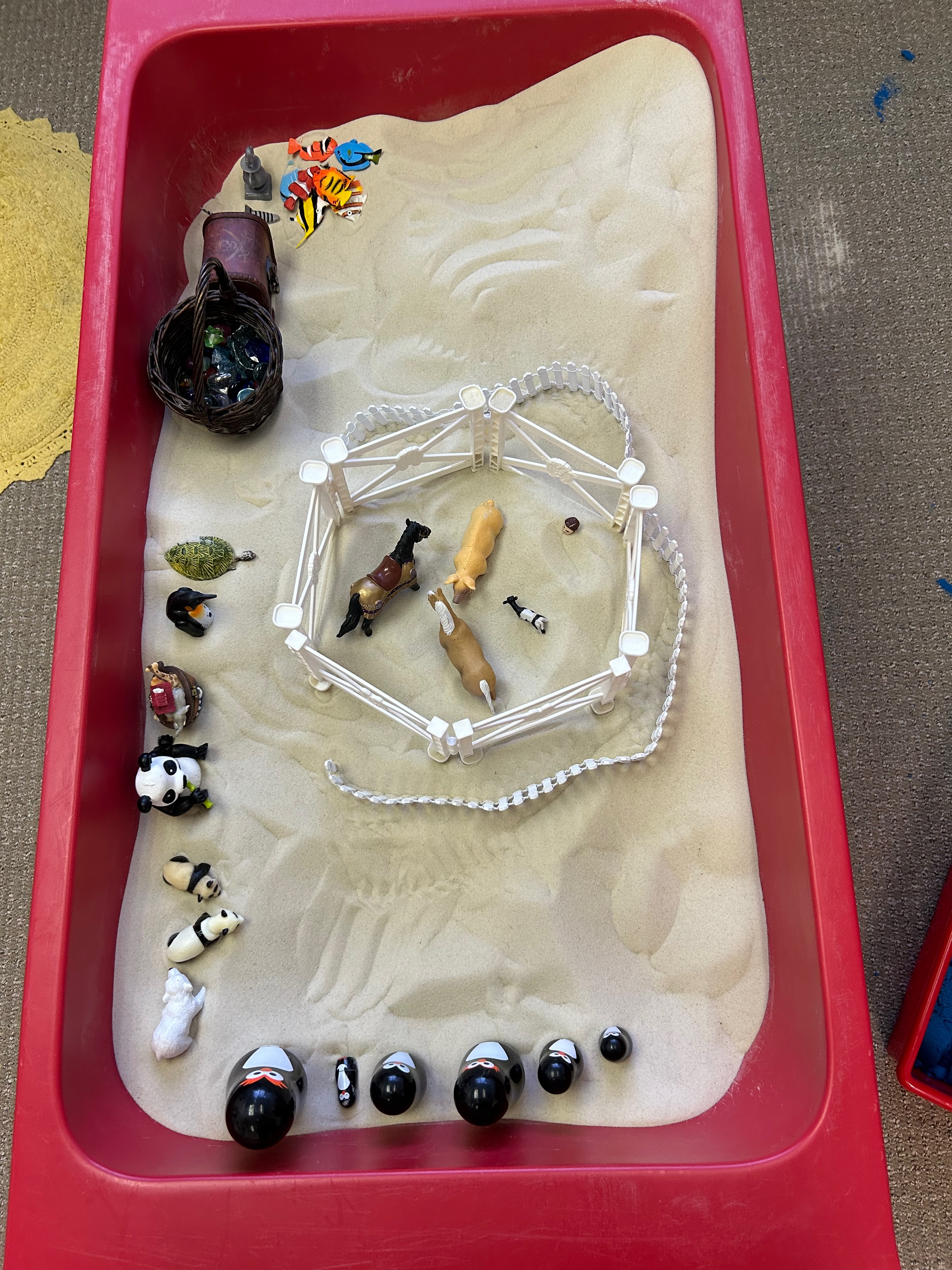 Sandtray setup with horse figures