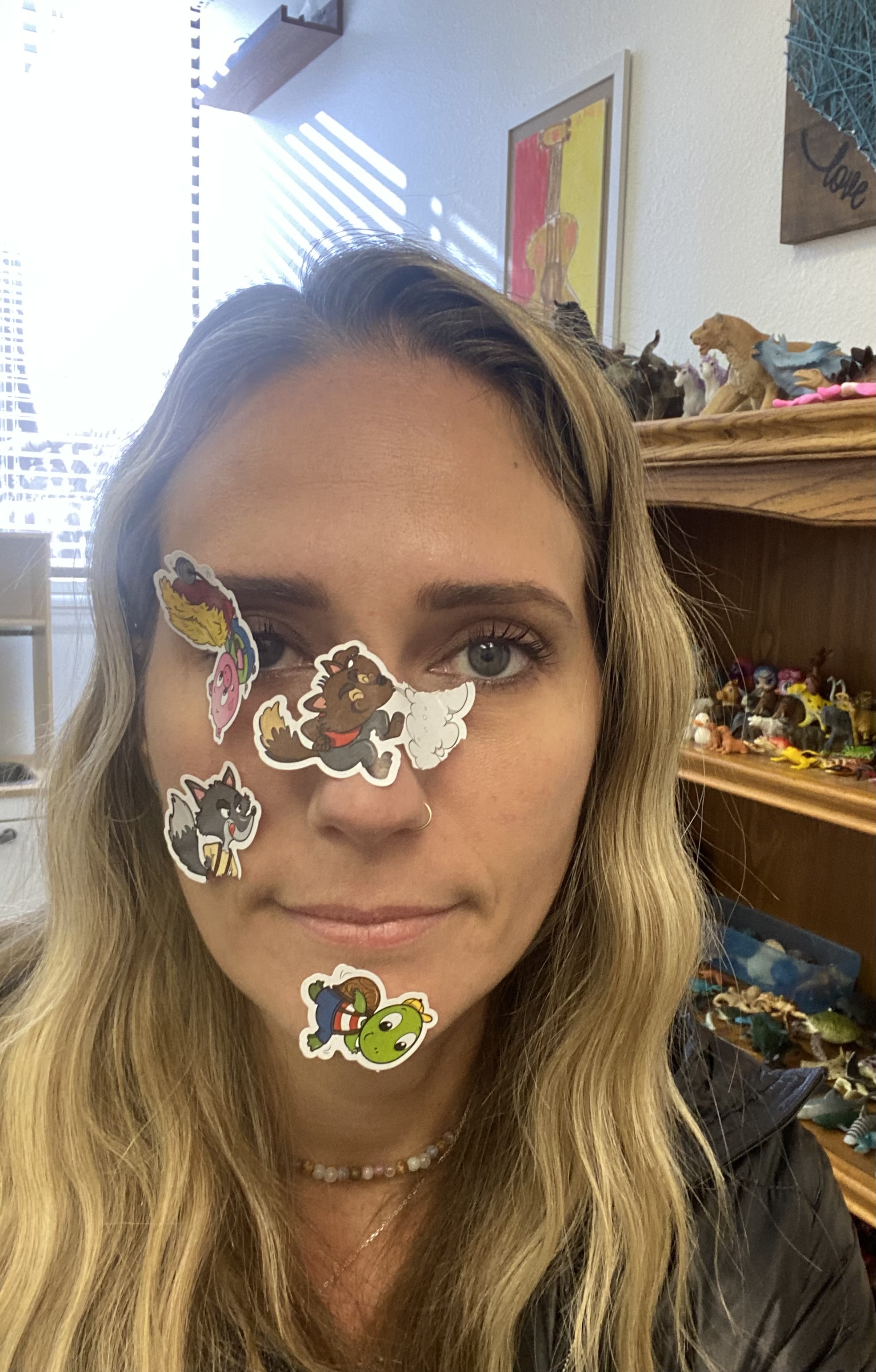 Lisa Forbes with playful stickers on her face